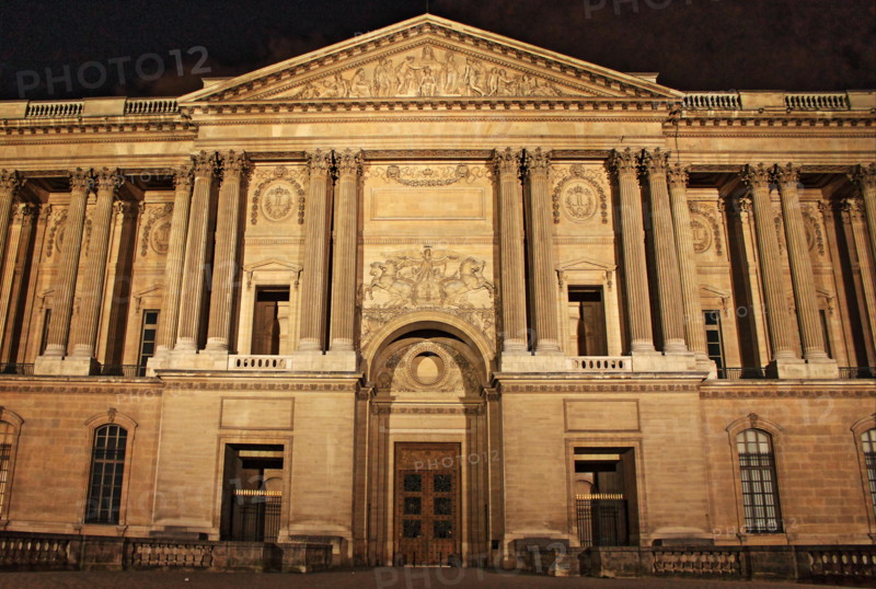Paris, France - May 24, 2015: View of Perrault's Colonnade by night in Louvre Museum
