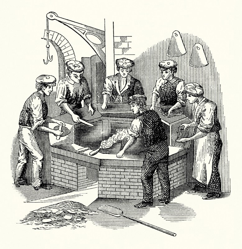 An old engraving showing men working at a hatmaker’s battery used in the production of felt hats. It is from a Victorian mechanical engineering book of the 1880s. The battery is a boiler or kettle containing hot water, plus a small quantity of sulphuric acid. The acid aids the fur to ‘felt’ more easily when it adheres to the conical hat bodies. A ‘nap’ is the raised (fuzzy) surface on cloths such as velvet or moleskin, or the surface of felt or beaver pelt. The workers aid this napping process by rubbing with their wooden tools called ‘gloves’.