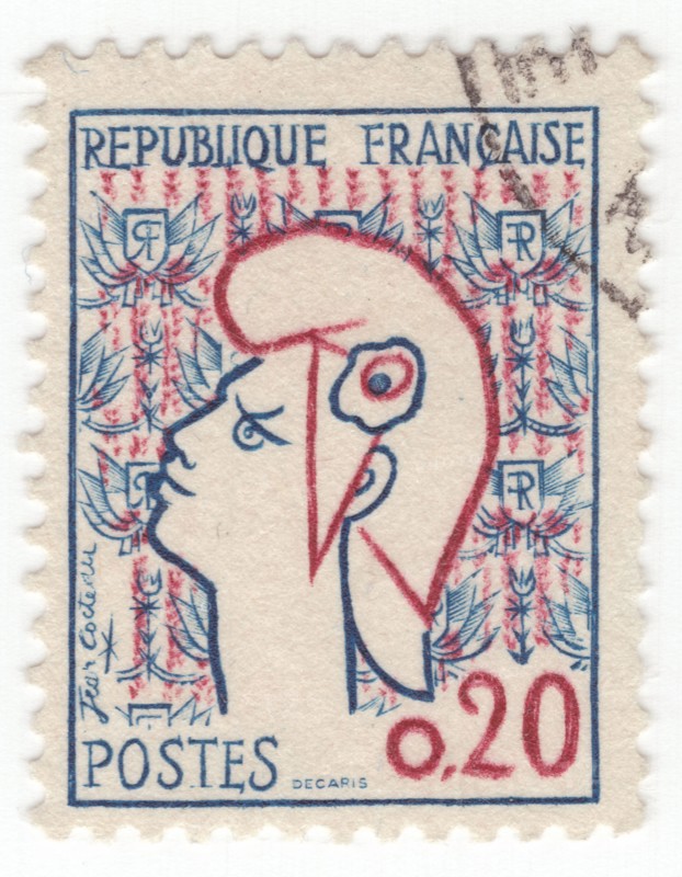 FRANCE - 1961  February 23: An 20 centimes blue and carmine postage stamp postage stamp depicting Marianne — national personification of the French Republic since the French Revolution, as a personification of liberty, equality, fraternity and reason, as well as a portrayal of the Goddess of Liberty. She is depicted in the Triumph of the Republic, a bronze sculpture overlooking the Place de la Nation in Paris. As a national icon Marianne represents opposition to monarchy and the championship of freedom and democracy against all forms of oppression. Marianne also wore a Cockade