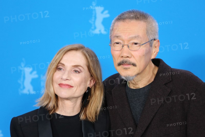 Berlin, Germany, 19th February 2024, Isabelle Huppert and Director, Screenwriter, Producer, Camera, Editor, Hong Sangsoo at the photo call for the film A Traveler’s Needs (Yeohaengjaui Pilyo)  at the 74th Berlinale International Film Festival. Photo Credit: Doreen Kennedy / Alamy Live News.