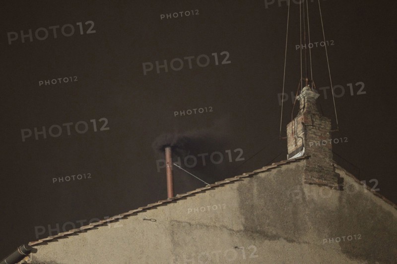 March 12 - Vatican City State ( Holy See) - This afternoon, at 19:42, a black smoke is emitted from the chimney installed on the roof of the Sistine Chapel, the signal that the cardinal electors have not elected a new pope in the first ballot of the conclave. (Credit Image: © Evandro Inetti/ZUMAPRESS.com)