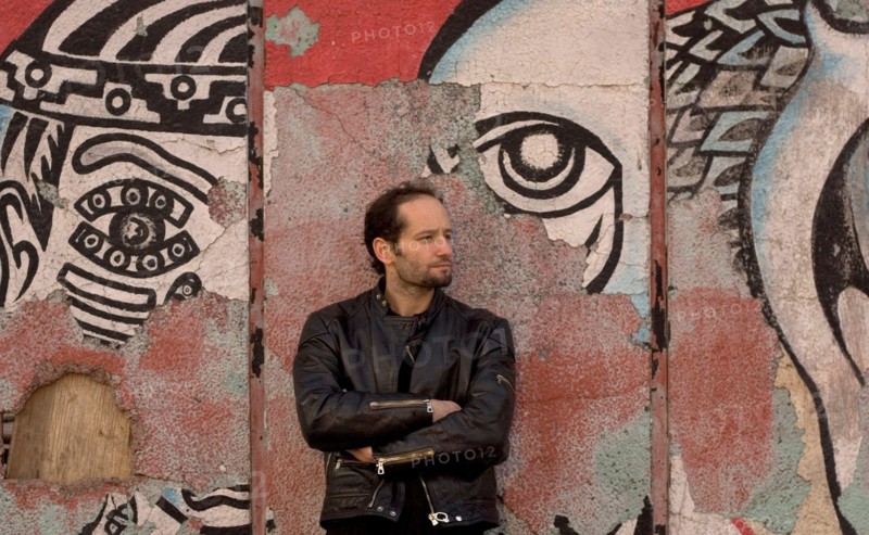 Jan 19, 2006; Mexico City, MEXICO; Mexican film maker, CARLOS REYGADAS' work is quintessentially Mexico City, here photographed in front of a decomposing mural on the streets of the historical center of Mexico City. His recent movie, 'Batalla en el Cielo' or 'Battle in Heaven,' was pulled from its original screening at the Sundance festival this year because of its opening scene, a young woman performing fellatio on an older, chubby man. The film was shown at other screenings as part of the festival and is scheduled to open Feb. 24 in Los Angeles. Reygadas won the Camera d'Or 'special mention
