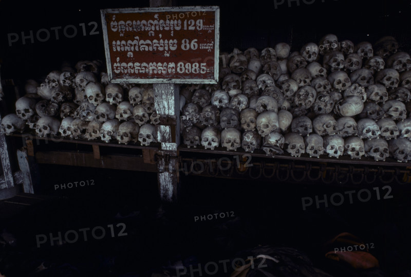 Cambodia: During the Pol Pot years 1975-8 the Khmer Rouge killed between one and two million of their own people. Here at a site just outside Phnom Penh are the remains of one mass grave.