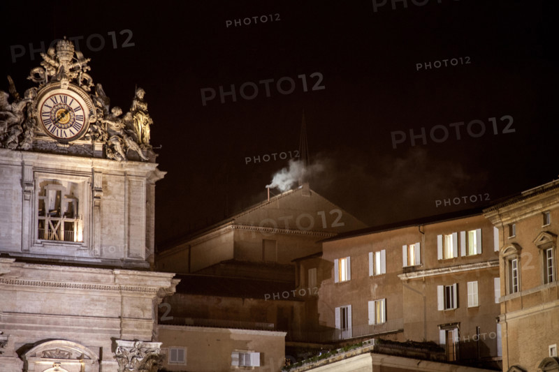 Vatican City, Rome, Italy, 13rd March, 2013. Cardinal Bergoglio is the new Pope Francis I. White smoke from the chimney above the Sistine Chapel in Rome. The 115 Cardinals electors have chosen the new pope Francis I, successor to Pope Benedict, who resigned last month.