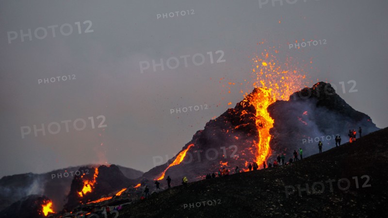 Molten lava flowing from a small volcanic eruption in Mt Fagradalsfjall, near the capital of Reykjavik, Southwest Iceland, in March 2021.