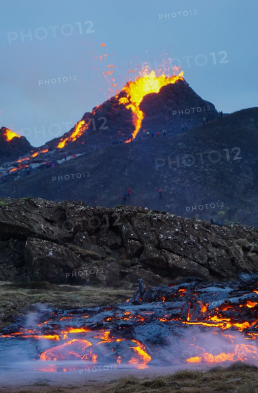 Molten lava flowing from a small volcanic eruption in Mt Fagradalsfjall, near the capital of Reykjavik, Southwest Iceland, in March 2021.