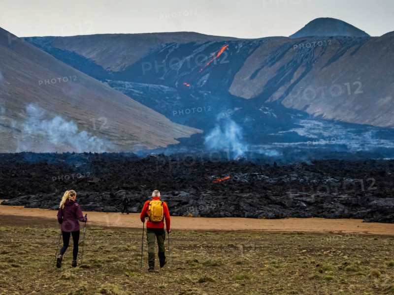Local Icelanders visiting lava flows from Fagradalsfjall Volcano, Iceland