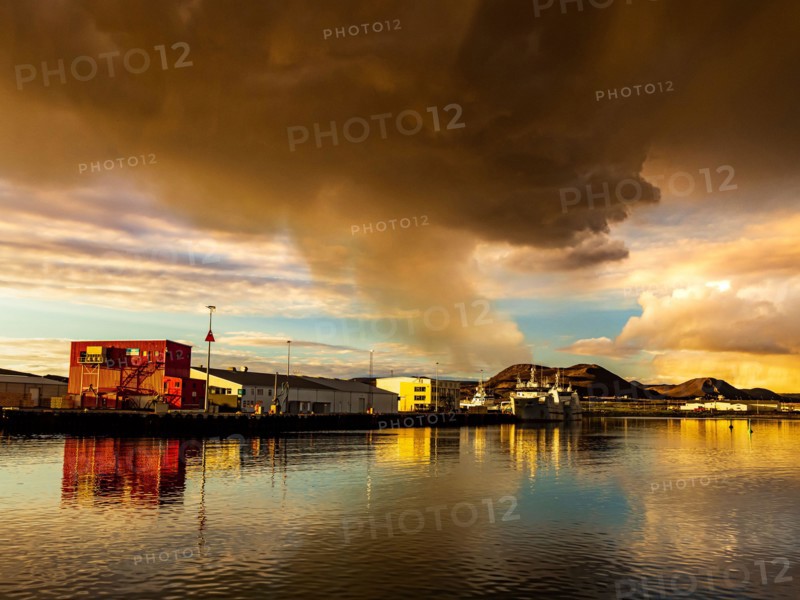 Gas cloud from Fagradalsfjall, view of volcanic eruption at Grindavik Harbor, Iceland