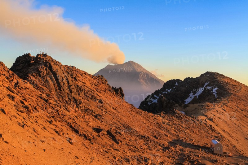 Evening on the slope of Iztaccihuatl volcano viewing the smoking Popocatepetl, Mexico
