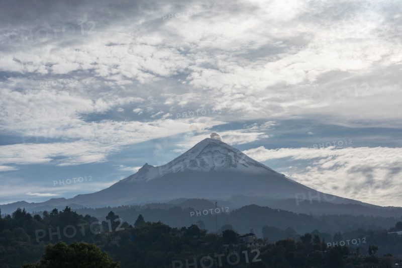 Popocatepetl volcano seen in the morning from a town in the state of Mexico, sunrise in the province.