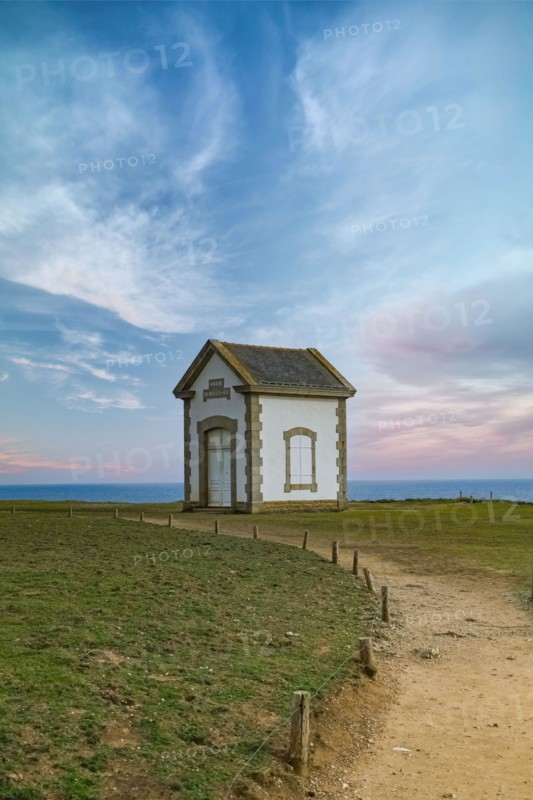 Belle-Ile in Brittany, small building on the cliffs at the Cote Sauvage, the foghorn house