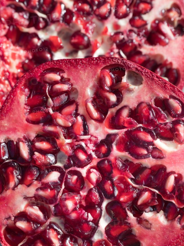Another in my ongoing series of photogenic fruit and vegetables. This Pomegranate is not a favourite of mine. In fact, I just hate the things, and the way the damn seeds get everywhere. But my wife loves them. De gustibus...  In fact, she was about to eat this handsome example, when I spotted its vivid symmetries and decide to photograph it instead. But she got it in the end!