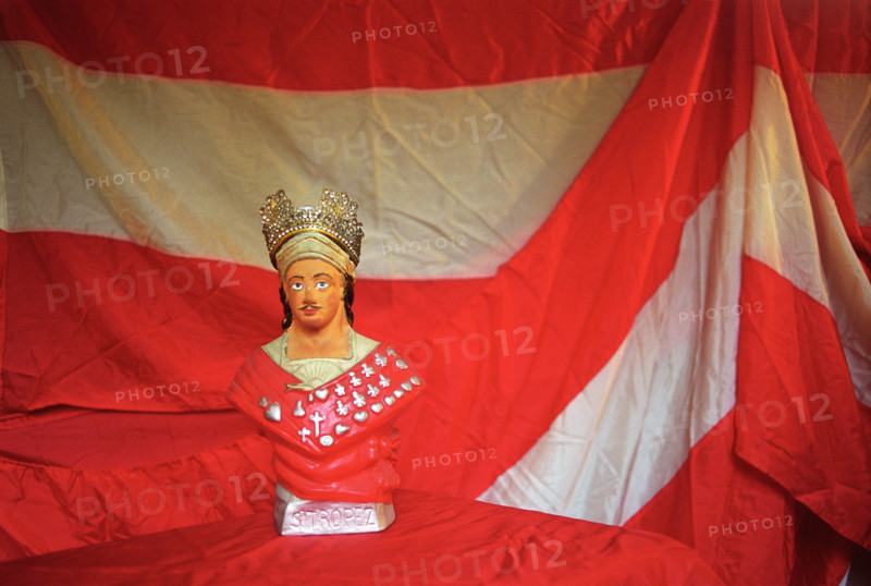 Europe France. St Tropez, South of Les Bravades Bravade annual festival of Patron Saint of town Saint Tropez Effigy small statue in shop window.