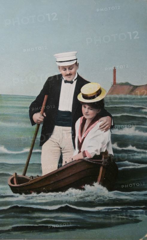 Nostalgic love lovers in fake rowingboat circa 1909 postcard