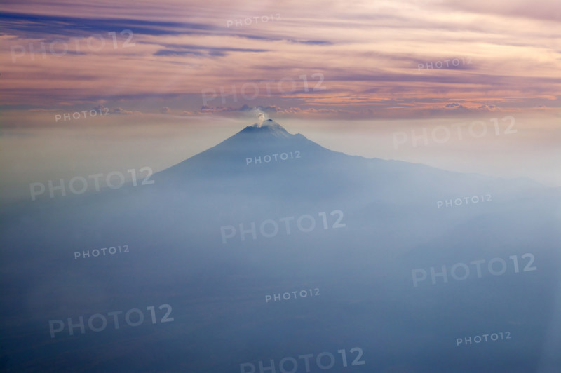 Popocatepetl volcano in Mexico DF city aerial view from aircraft