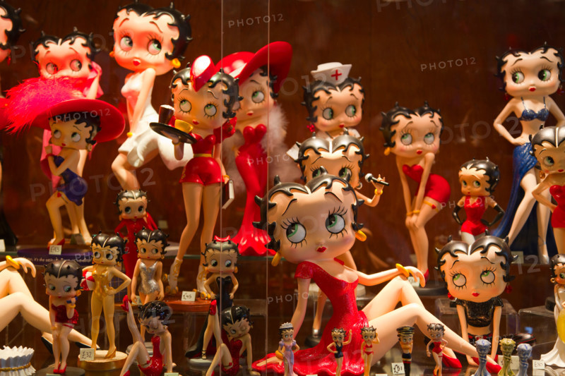 Betty Boop figurines on display in a shop window in Bourton-on-the-Water in the Cotswolds