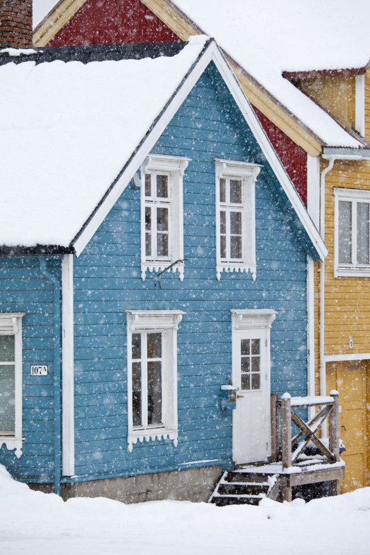 Quaint traditional architecture wooden buildings along Storgata in city of Tromso, in the Arctic Circle in Northern Norway