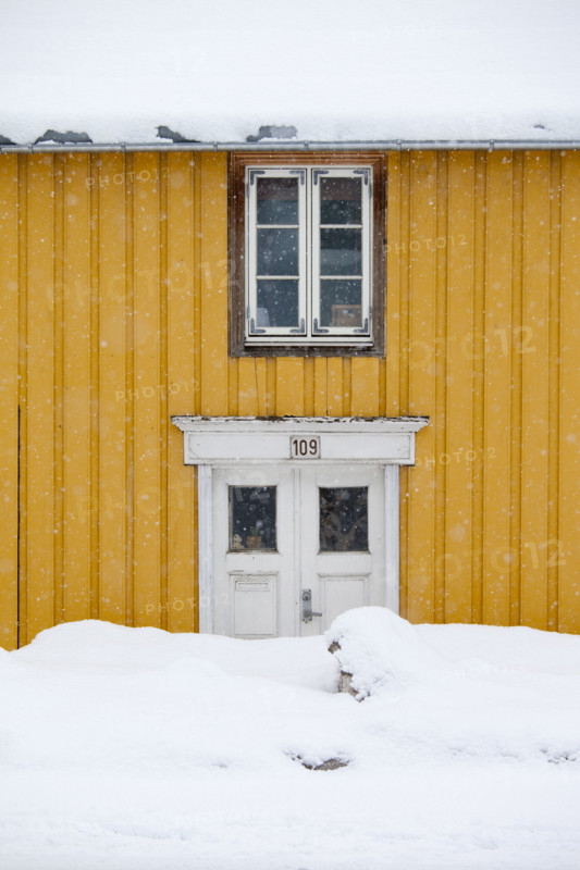 Traditional wooden buildings along Storgata in the quaint area of Tromso, in the Arctic Circle in Northern Norway
