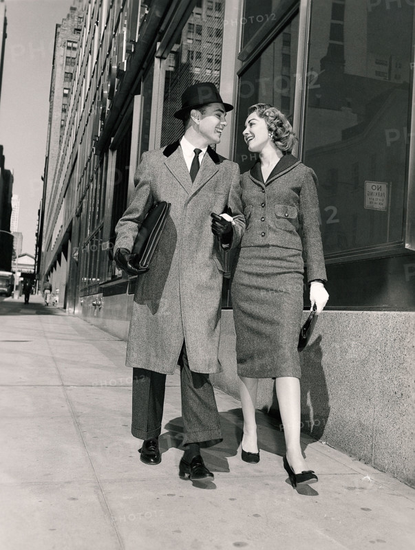 Couple walking on city street