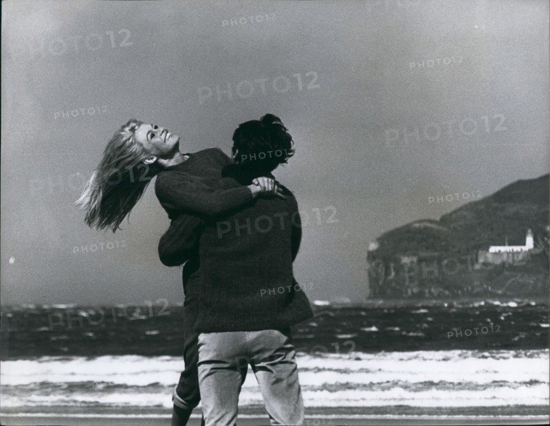 Jan 1, 1960 - Laughing Girl... beside the seaside, not her beloved St. Tropez but Seacliffe Beach, near Tantallon Castle. A great big hug Brigitte Bardot for her leading man Laurent Terzieff.