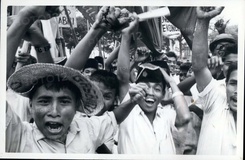 Apr. 18, 2012 - Indonesia, Jakarta -- Muslim students stage mass anti-Communist rallies with 5,000 to 10,000 demanding the Communist Party and the affiliates be banned after aborted Red coup of Oct 1, 1965. The Communist Party (PKI) was suspended on Oct 18. Here they are shouting ''gagang aidit'' - kill aidit.