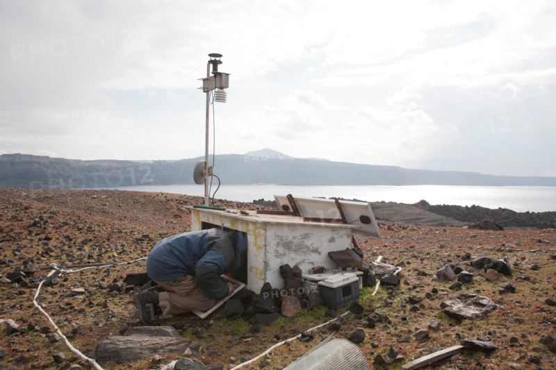Nea Kameni Island. 14th February, 2015. in Santorini Greece, Costas Papazachos seismologist and professor at the Aristotle University of Thessaloniki and George Vougioukalakis, Dr. Volcanologist geothermal researcher, went to the island of Nea Kameni to check the monitoring equipment that make gas measurements such as carbon dioxide and hydrogen sulfide and repair some damages that hapend due to bad weather conditions. Credit:  Konstantina Sidiropoulou/Alamy Live News