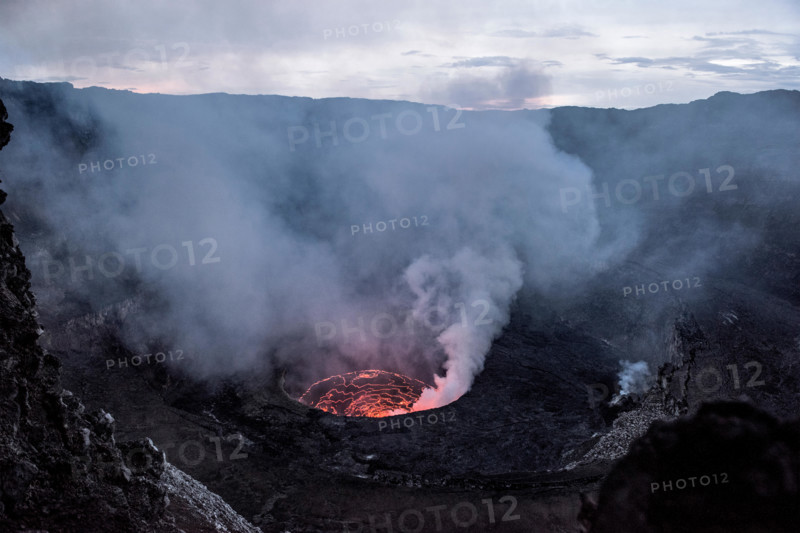 Crater of nyiragongo volcano in eruption
