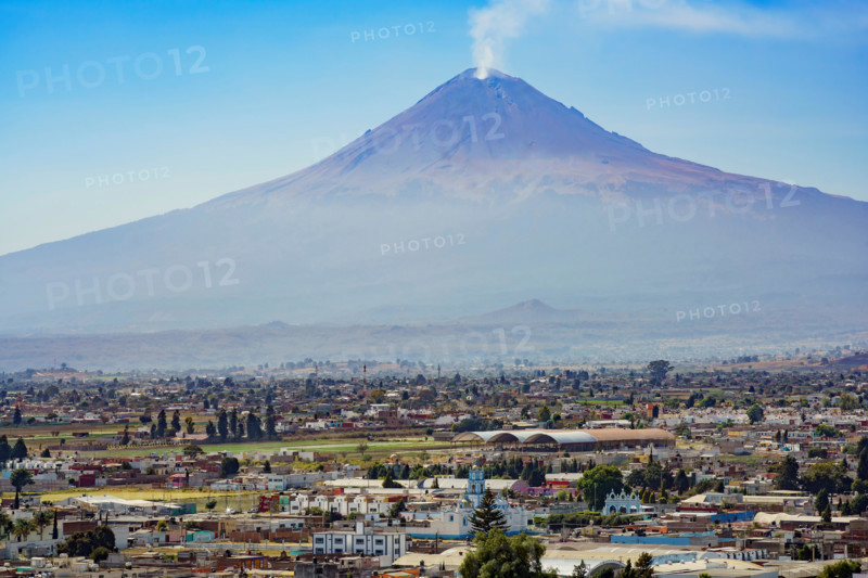 Aerial view of The beautiful Popocatepetl Mountain with smoke, Cholula, Mexico
