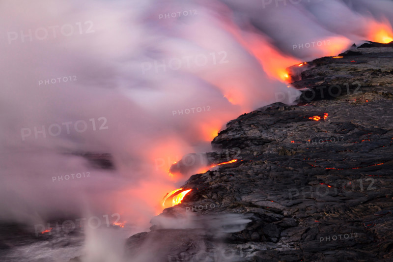 HI00341-00...HAWAI'I - Lava flowing into the Pacific Ocean from the East Riff Zoneof the Kilauea Volcano on the Island of Hawai'i.