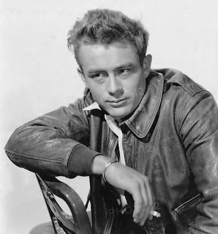 This iconic photograph from 1955 captures James Dean, the American actor, known for his role in films such as 'Rebel Without a Cause'. He became a cultural icon and remains a symbol of youthful rebellion and Hollywood stardom.