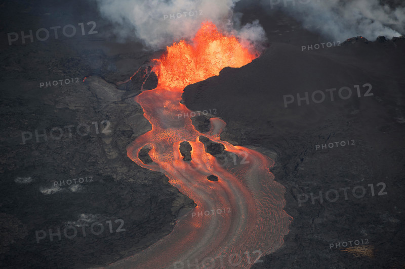 aerial view of lava from Kilauea Volcano, erupting from fissure 8 in Leilani Estates, near Pahoa, sending a river of lava to Kapoho, Hawaii, USA
