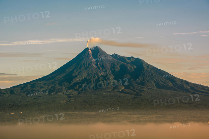 beauty of sunrise merapi mountain, indonesia. Mount Merapi is one of the most active mountains in Indonesia