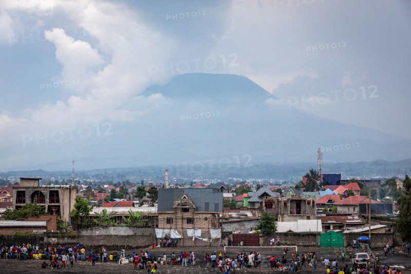 The city of Goma, Democratic Republic of Congo, with Nyiragongo volcano in the distance