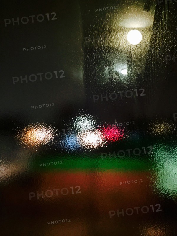 Night scene through frosted glass