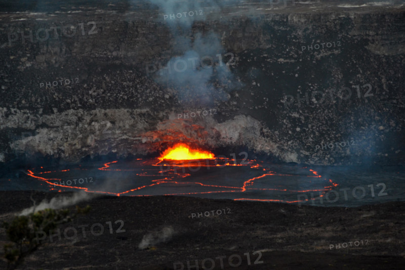 Active lava exploding inside the Halemaumau Crater at night, Kilauea Volcano, Volcanoes National Park, Big Island, Hawaii, USA