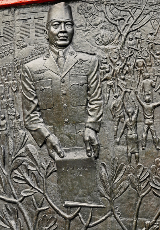 jakarta, dki jakarta/indonesia - april 20, 2009: detail of the relief at pancasila sakti  memorial site, sukarno holding spersemar