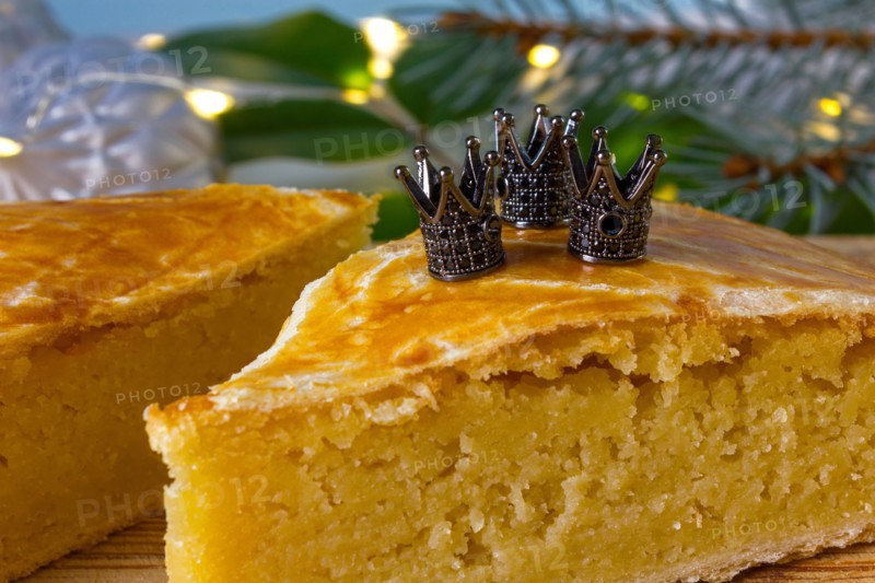 Three kings cake or galette des rois in French. Traditional epiphany cake with decorative crown.