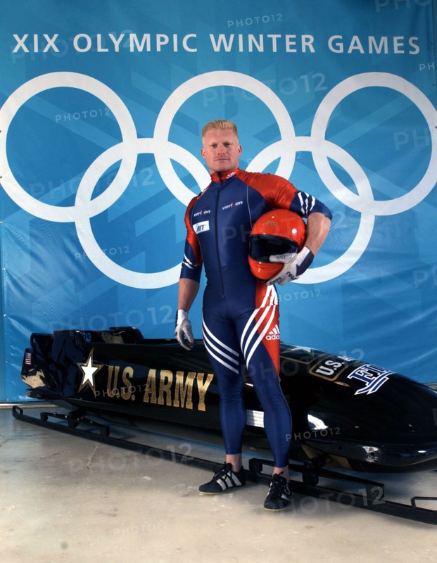 World Class Athlete SPECIALIST (SPC) (E-4) Douglas Sharp, USA, poses with a four-man bobsled. SPC Sharp and his team members won the Bronze medal at the XIX OLYMPIC WINTER GAMES at the Utah Olympic Park in Park City, Utah, during the 2002 games. Subject Operation/Series: XIX OLYMPIC WINTER GAMES Base: Salt Lake City State: Utah (UT) Country: United States Of America (USA)