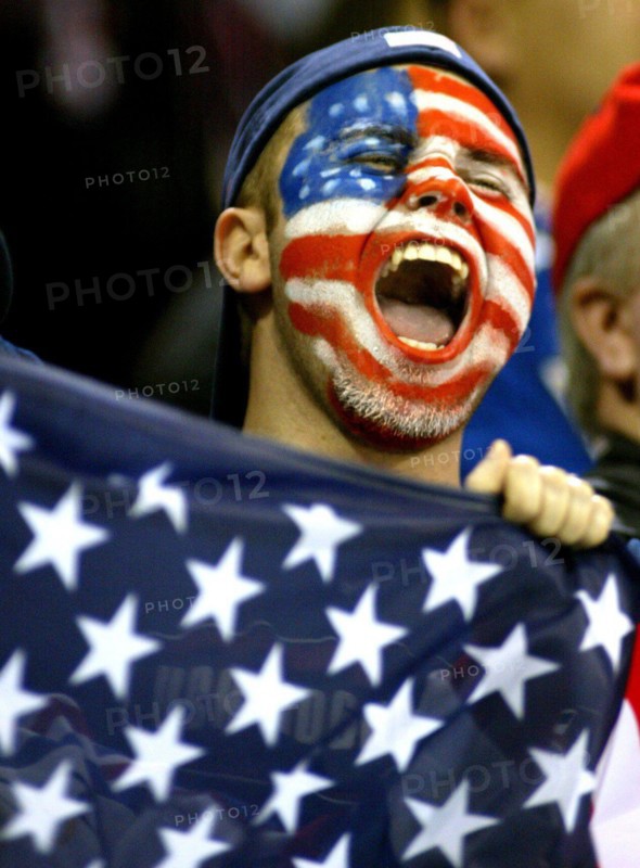 Feb. 18, 2002 - U.S. - NO MAGS, NO SALES -- KRT SPORTS STORY SLUGGED: OLY-HOCKEY KRT PHOTOGRAPH BY ERICH SCHLEGEL/DALLAS MORNING NEWS (February 18) SALT LAKE CITY, UT-- Daniel Vice, 23, of West Valley City, Utah cheers on Team USA as the US beat Belarus 8-1 in the 2002 Olympic Games at the E Center in Salt Lake City, Utah Monday February 18, 2002. (DA) NC KD BL 2002 (Vert) (lde) (Credit Image: © Dallas Morning News/mct/ZUMAPRESS.com)