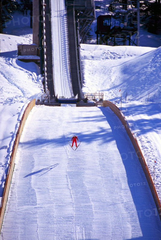 Ski Jumper jumping on Ski Jump at Whistler Olympic Park - Site of Vancouver 2010 Winter Olympics Games British Columbia Canada