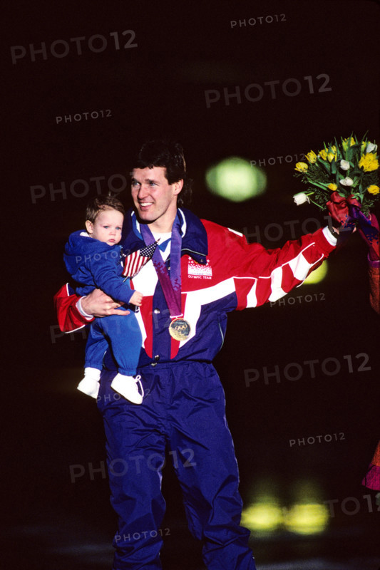 Dan Jansen (USA) with  his baby daughter after winning the gold in the 1000 meters speed skating event.