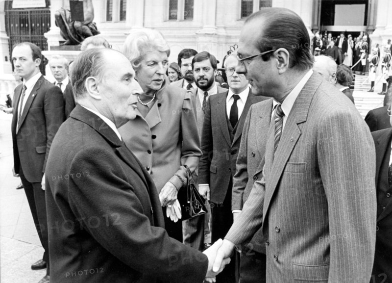 Mayor of Paris JACQUES CHIRAC (right) shaking hands with French president FRANCOIS MITTERRAND