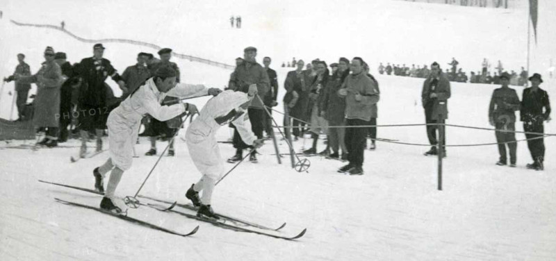 The image shows Nils Karlsson, a prominent athlete, during the 1948 winter games in St. Moritz, Switzerland, capturing a moment of his participation in the event.
