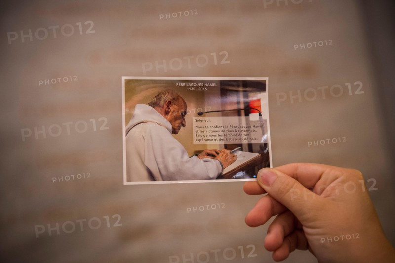A picture of Father Jacques Hamel - Saint Bartholomew's church, Rome, Italy.