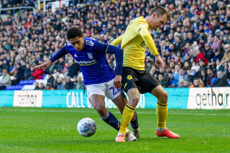 Birmingham, UK. 30th Nov, 2019.  Jude Bellingham of Birmingham City battling with Jake Cooper of Millwall during the Sky Bet Championship match between Birmingham City and Millwall at St Andrews, Birmingham on Saturday 30th November 2019. (Credit: Alan Hayward | MI News) Photograph may only be used for newspaper and/or magazine editorial purposes, license required for commercial use Credit: MI News & Sport /Alamy Live News