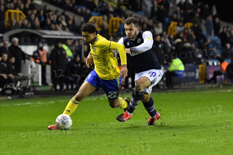 LONDON, ENGLAND - FEBRUARY 26TH Jude Bellingham of Birmingham battles for possession with Mason Bennett of Millwall during the Sky Bet Championship match between Millwall and Birmingham City at The Den, London on Wednesday 26th February 2020. (Credit: Ivan Yordanov | MI News)Photograph may only be used for newspaper and/or magazine editorial purposes, license required for commercial use Credit: MI News & Sport /Alamy Live News