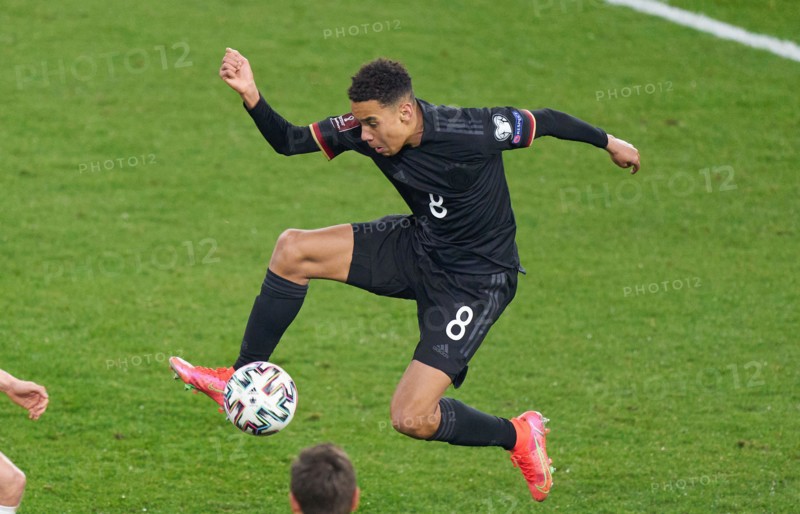 Jamal MUSIALA, DFB 8 drives, controls the ball, action,  in the match GERMANY - ICELAND  Deutschland - ISLAND Qualification for World Championships, WM Quali, Season 2020/2021,  March 25, 2021  in Duisburg, Germany.  © Peter Schatz / Alamy Live News  Important: DFB regulations prohibit any use of photographs as image sequences and/or quasi-video.
