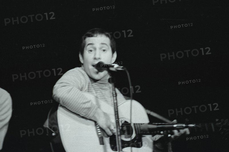 June 17, 1967, Monterey, California, USA - PAUL SIMON performs with Simon & Garfunkle during the Monterey International Pop Music Festival. The festival was a three-day concert event held June 16 to June 18, 1967 at the Monterey County Fairgrounds. Jill Gibson was an experienced photojournalist by 1967 and the Official Photographer for The Monterey Pop Festival. These are her images, many of which have never been released prior to now, in commemoration of the 50th Anniversary of Monterey Pop. (Credit Image: © Jill Gibson/ZUMA Press Wire Service)