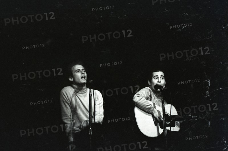 June 17, 1967, Monterey, California, USA - ART GARFUNKLE, left, and PAUL SIMON, right, perform as Simon & Garfunkle during the Monterey International Pop Music Festival. The festival was a three-day concert event held June 16 to June 18, 1967 at the Monterey County Fairgrounds. Jill Gibson was an experienced photojournalist by 1967 and the Official Photographer for The Monterey Pop Festival. These are her images, many of which have never been released prior to now, in commemoration of the 50th Anniversary of Monterey Pop. (Credit Image: © Jill Gibson/ZUMA Press Wire Service)