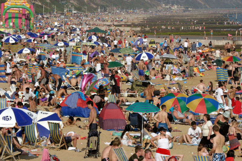 Crowded beach Bournemouth Dorset England UK